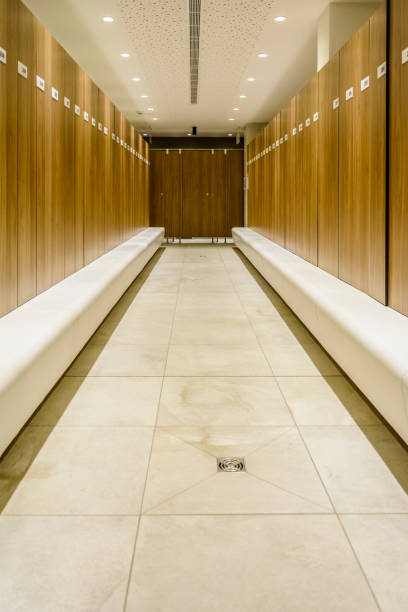 istock Modern Storage lockers in a swimming pool with bench , and led lighting. 996346306