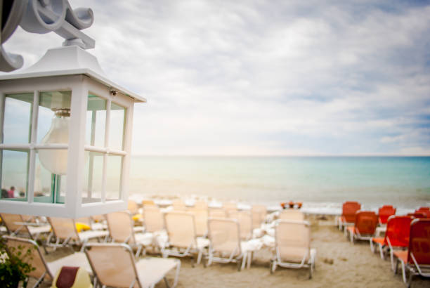istock Lantern on the beach with a sea in the background 996348918