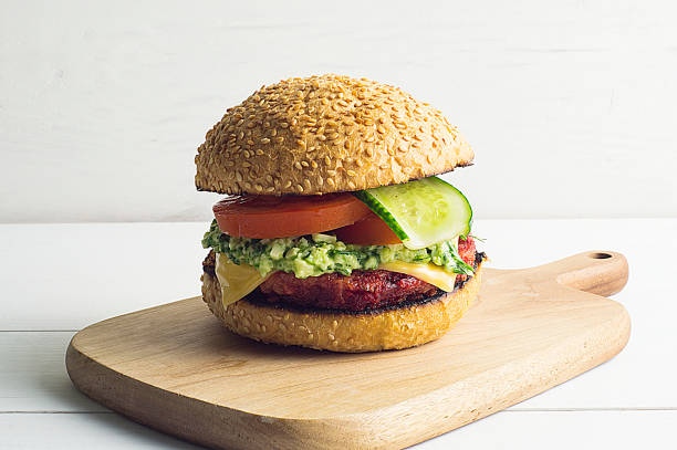 istock Veggie Burger with beet Patty and pesto sauce 996354194