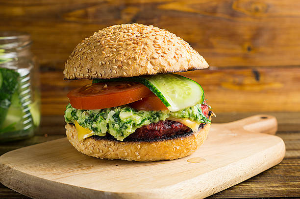 istock Veggie Burger with beet Patty and pesto sauce 996354324