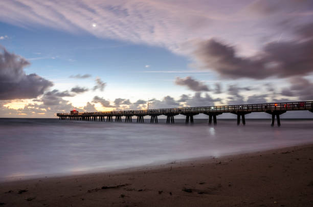 istock Pompano Beach, FL Pier at Sunrise with Dark Clouds 996359864