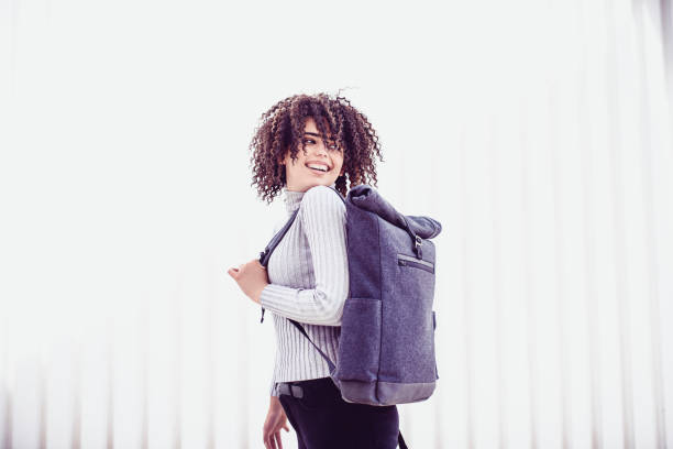 istock Cute Female With Backpack Having Fun On Skating Ramp 996361990