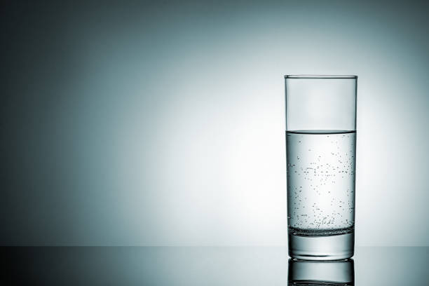 istock Glass of water with reflection 996364152