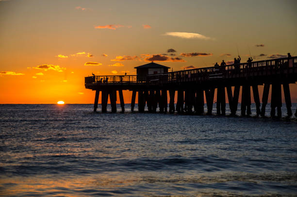 istock Pompano Beach, FL Pier at Sunrise from the Shoreline view from the north side 996365512