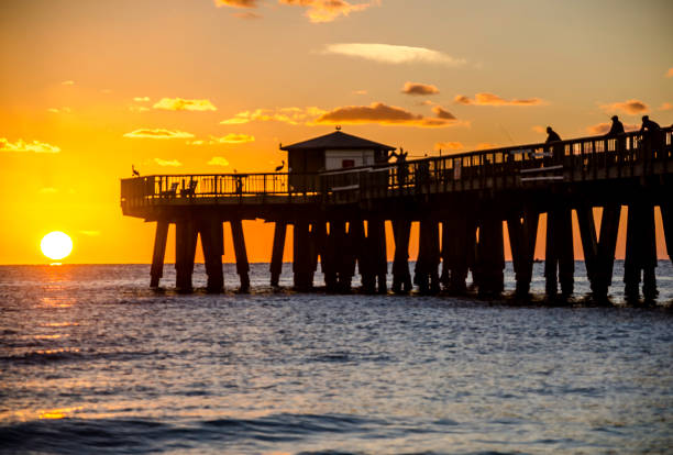 istock Pompano Beach, FL Pier at Sunrise from the Shoreline view from the north side 996365514