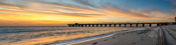 Pompano Beach, FL Pier at Sunrise from the Shoreline view from the north side