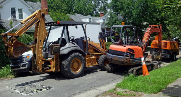 istock Heavy Construction Machines in Residential Neighborhood 996372462