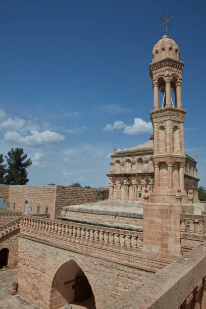 Virgin mary church. Mardin - Turkey According to the local Syriac community, the 6th-century church was originally established by the three Kings of the Orient. The Syriac name of the church is Yoldath (Aloho). The exterior of the dome and bell tower are 20th-century additions. The church bears a striking similarity to the large church at the Deyr-ül Zafaran Monastery, and is considered the most beautiful example of church architecture in Tur Abdin. midyat photos stock pictures, royalty-free photos & images