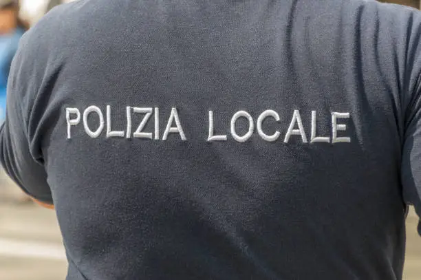 Photo of Polizia locale (territorial police force in Italy) sign on t-shirt.