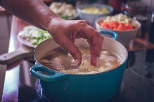 istock Preparing Delicious Minestrone Soup with Fresh Vegetables 996413140