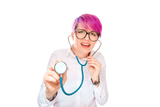 istock Puzzled woman listening with stethoscope 996435212