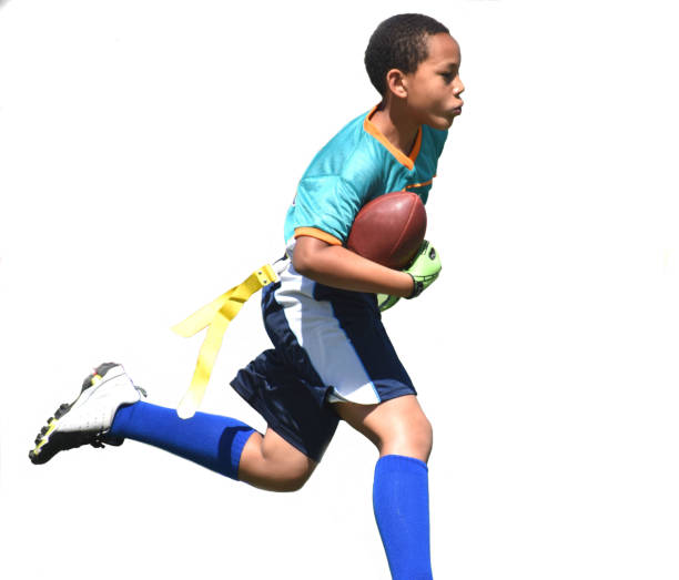 mixed race 10 year old running with a football, white background, summerDowners Grove, Illinois  USA