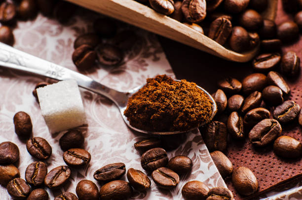 istock ground coffee.Spoon ground coffee.sugar cubes.coffee beans 996448902