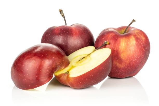 istock Fresh raw apple red delicious isolated on white 996459762