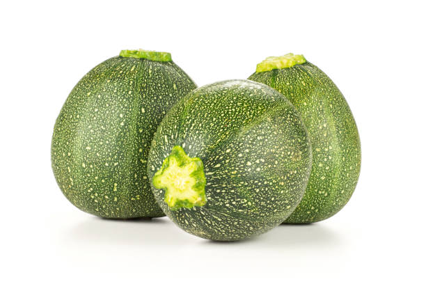 istock Fresh raw round Zucchini isolated on white 996481616