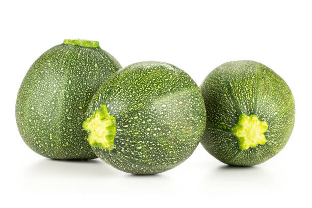 istock Fresh raw round Zucchini isolated on white 996481650