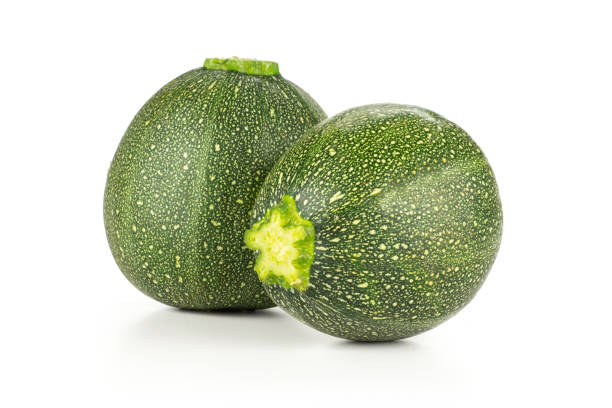 istock Fresh raw round Zucchini isolated on white 996481678