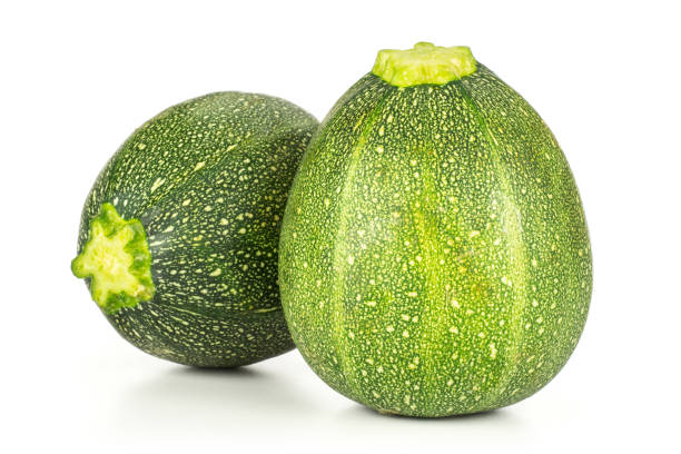 istock Fresh raw round Zucchini isolated on white 996481696