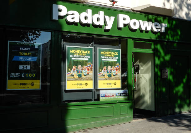 The front entrance to Paddy Power Bookmaker shop in Market Place Basingstoke, United Kingdom - July 05 2018:   The front entrance to Paddy Power Bookmaker shop in Market Place basingstoke photos stock pictures, royalty-free photos & images