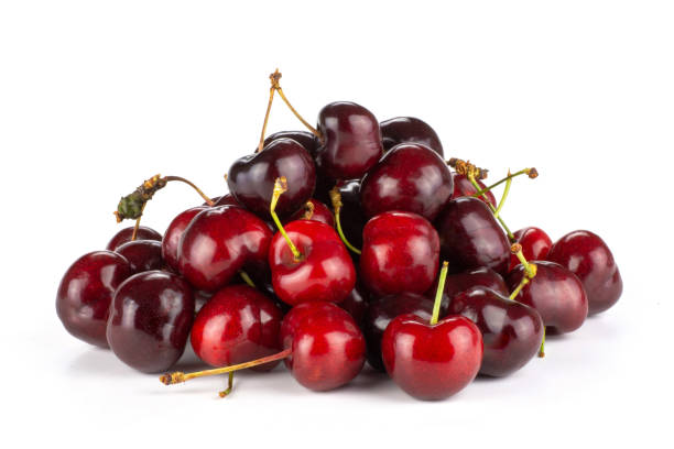 istock Fresh raw sweet red cherry isolated on white 996487116