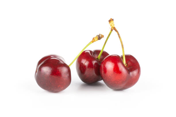 istock Fresh raw sweet red cherry isolated on white 996487136