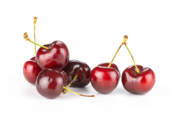 istock Fresh raw sweet red cherry isolated on white 996487138