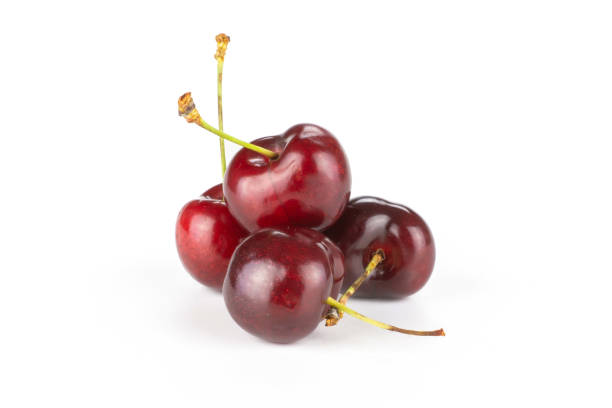 istock Fresh raw sweet red cherry isolated on white 996487144