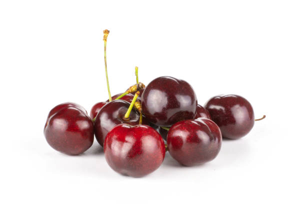 istock Fresh raw sweet red cherry isolated on white 996487150
