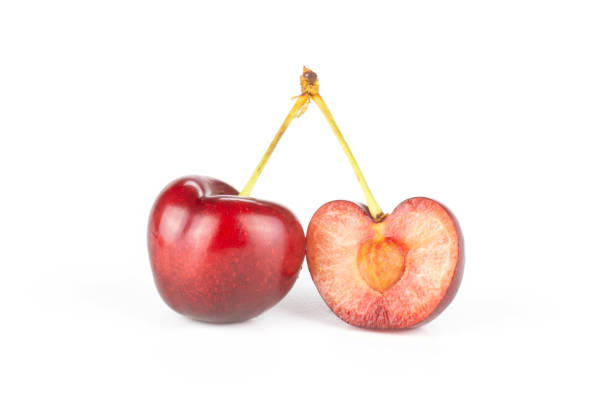 istock Fresh raw sweet red cherry isolated on white 996487152