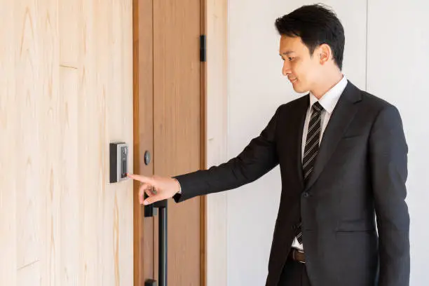 asian businessman in entrance