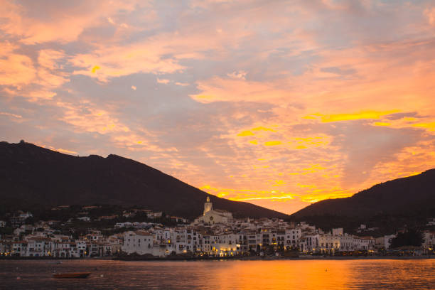 istock Sunset lighting city on shoreline 996510756