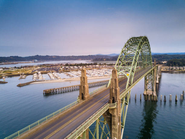 yaquina bay bridge and newport marina - aerial view - newport oregon imagens e fotografias de stock