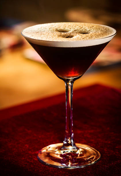 istock coffee espresso cream martini cocktail drink glass inside cozy bar 996535054