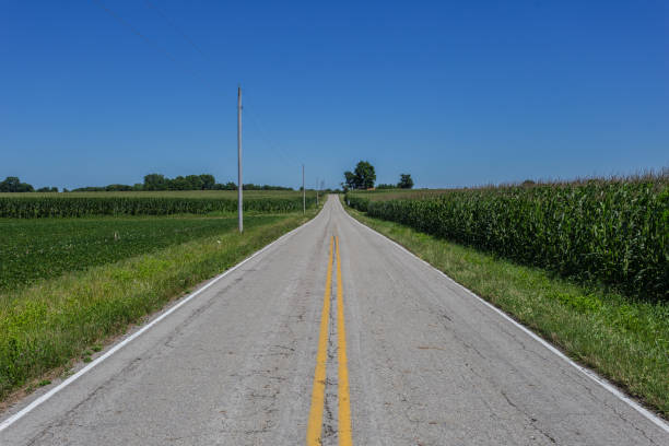 istock Road with yellow lines leading away 996538034