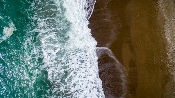 istock AERIAL: sunbathing on beach. No people 996558758