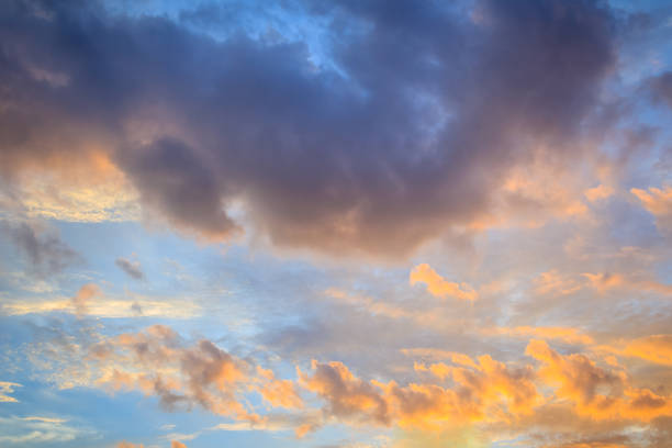 istock Red cloud and blue sky background. Dramatic sunset sky began to change from blue to orange. 996561122