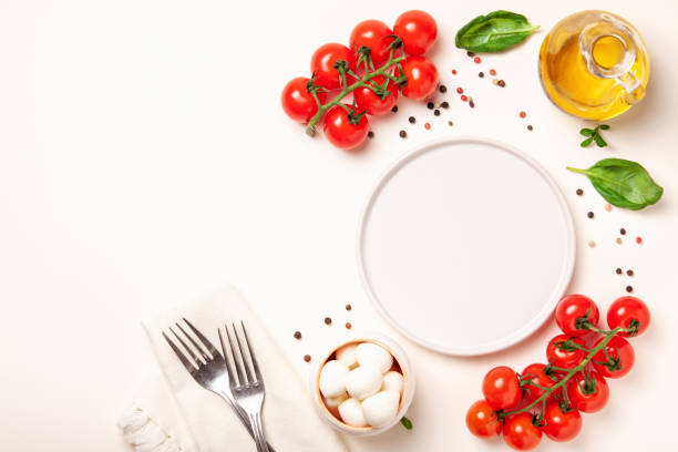 istock Tomatoes, basil, mozzarella cheese. Caprese salad ingredients 996576412