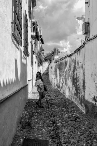 istock Woman tourist in downtown Granada Spain 996576682