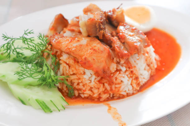 istock rice topped with pork and sauce 996579830