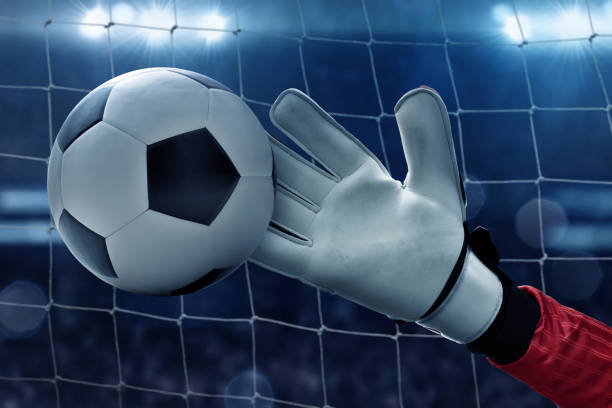 istock Soccer goalkeeper catches the ball 996585750