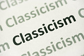 word Classicism printed on paper macro