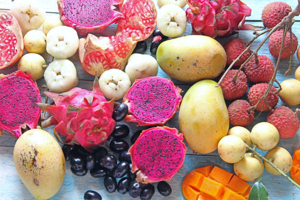 istock Fruits are on wooden background. 996606426