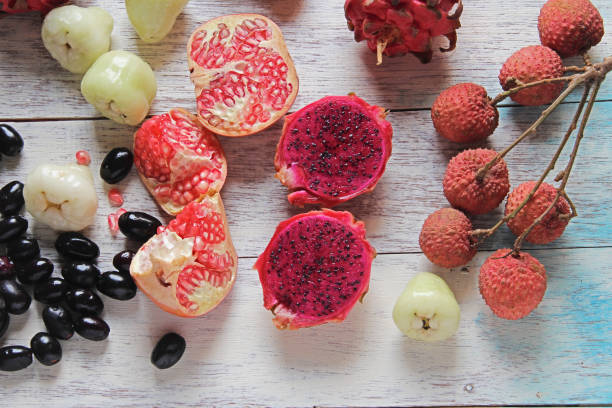 istock Fruits are on wooden background. 996606438