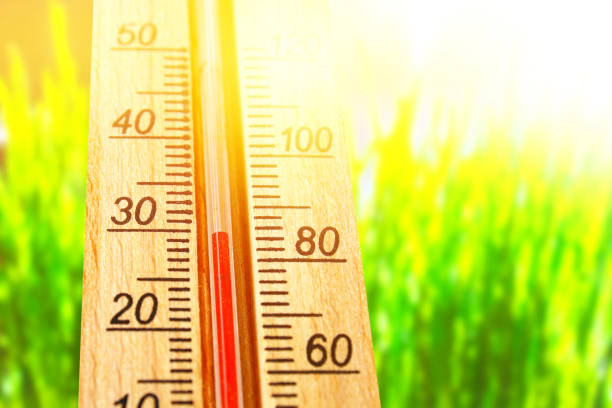 istock Thermometer displaying high 30 degree hot temperatures in sun summer day. 996611726