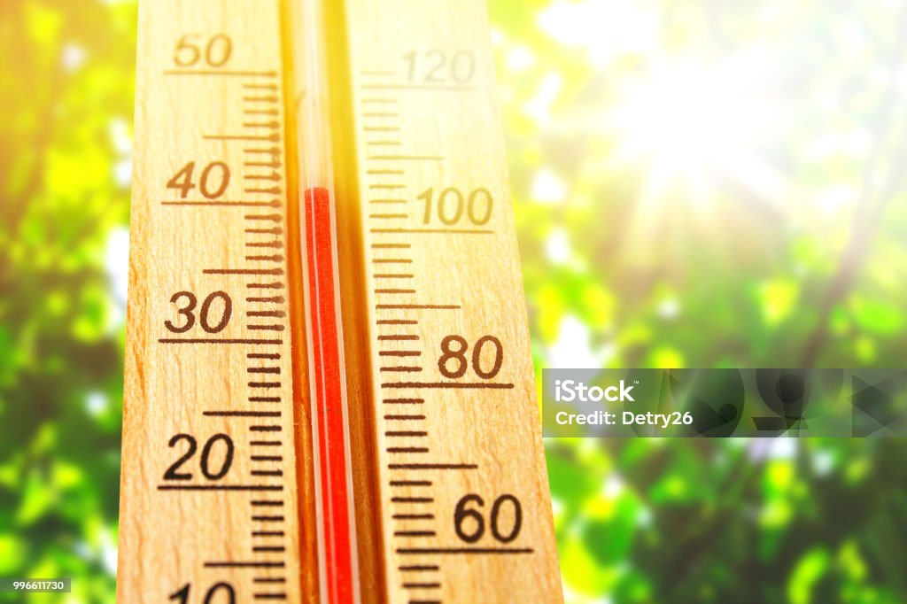 Thermometer displaying high 40 degree hot temperatures in sun summer day. Thermometer displaying high 40 degree hot temperatures in sun summer day Heat - Temperature Stock Photo