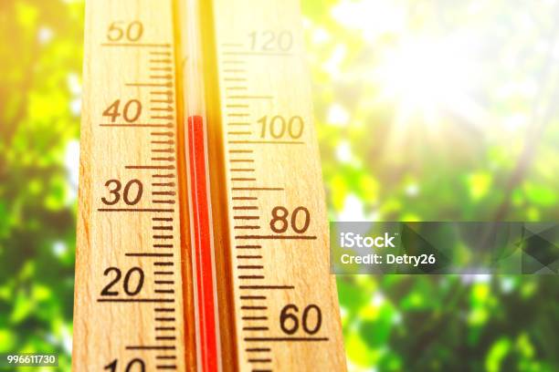 Thermometer Displaying High 40 Degree Hot Temperatures In Sun Summer Day Stock Photo - Download Image Now