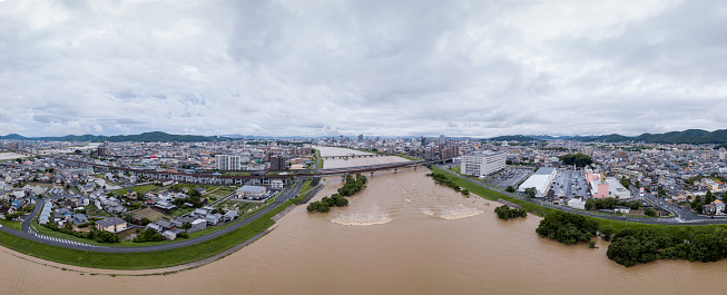 Aerial view of a flooded river in western Japan. Okayama, Japan. July 2018