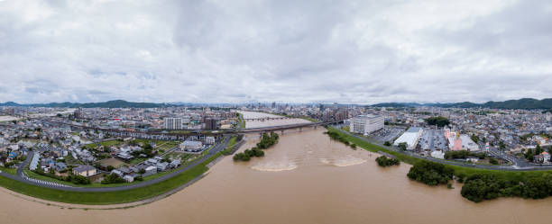 Aerial view of a flooded river in western Japan Aerial view of a flooded river in western Japan. Okayama, Japan. July 2018 kinki region photos stock pictures, royalty-free photos & images