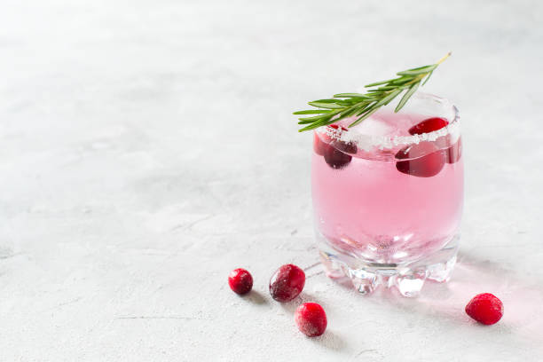 istock Cranberries cocktails with ice, berries and rosemary 996620972