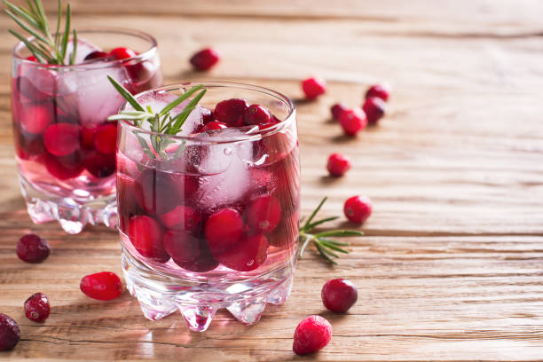 istock Cranberries cocktails with ice, berries and rosemary 996620980